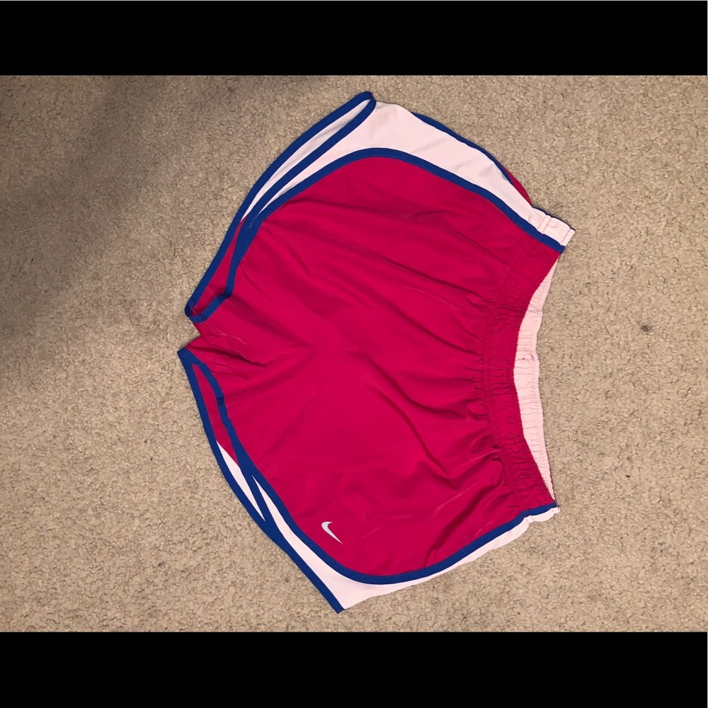 Pink and blue Nike running shorts